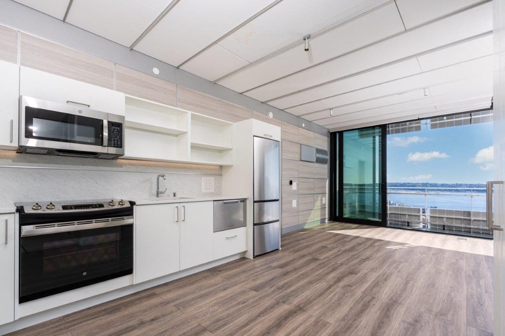 3ZERO3 New Apartments in Seattle, Washington Kitchen and Living Room