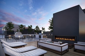 Boardwalk Apartments Exterior Fire Place - Photo Gallery 5