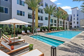 Jefferson La Mesa Apartments Pool Area and Lounge Chairs - Photo Gallery 6