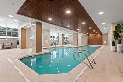 a swimming pool in the lobby of a hotel