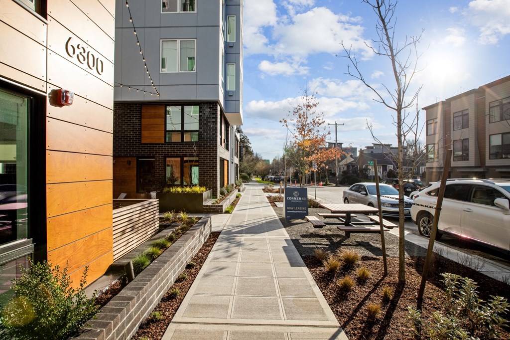 sidewalk outside corner 63 apartments