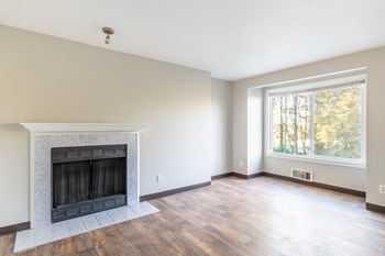 Aspire Apartments at Mountlake Terrace Living Room with Fireplace - Photo Gallery 11