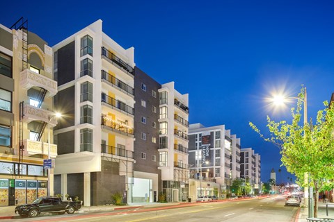 Hollywood CA Apartments for Rent - Exterior View of the Apartment Building at Dusk Showcasing Expansive Community