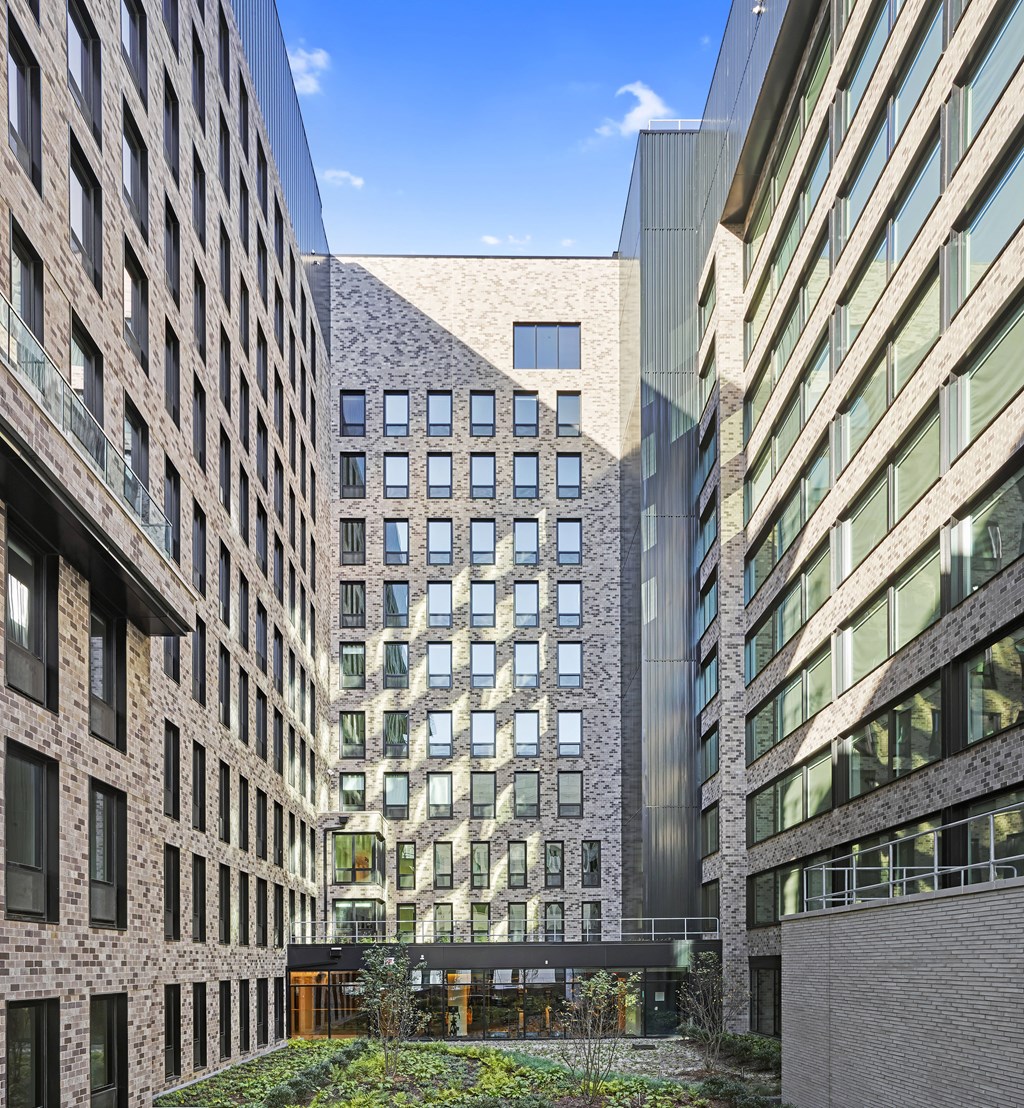 A modern building with a courtyard in the middle.