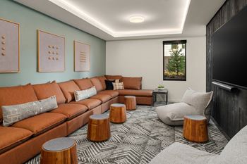 a living room with a couch and a tv