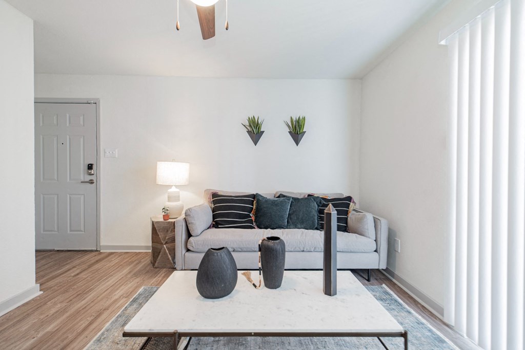 a living room with a couch and a coffee table