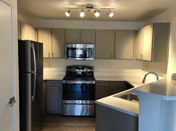 Quail Village Apartments Kitchen - Photo Gallery 8
