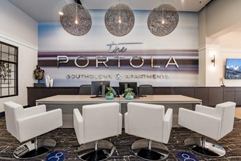 The Portola at SouthGlenn Apartments Leasing Office Desk and Chairs - Photo Gallery 3