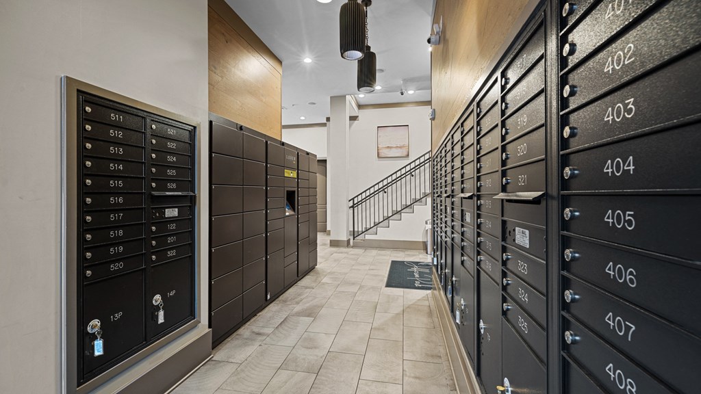 the lockers in the hallway of a building with a staircase