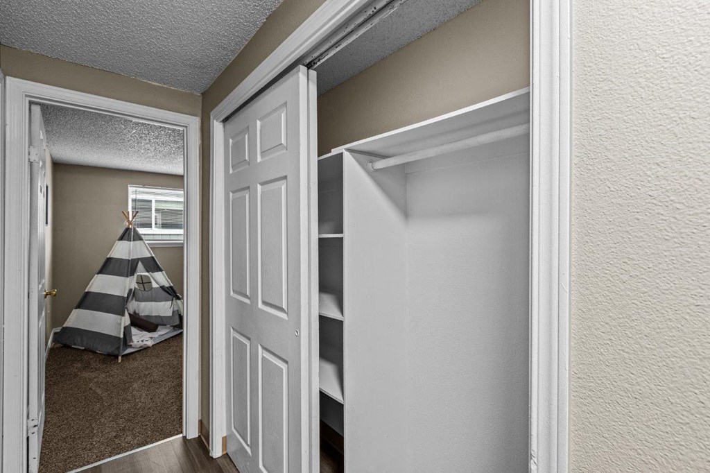 Paxton Apartments Hallway Closet and View into Bedroom