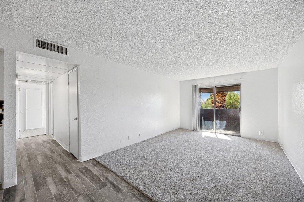 Madera at Metro Living Area with Patio Doors and Carpet