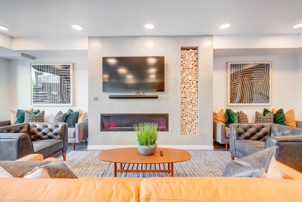 a living room with couches and a fireplace