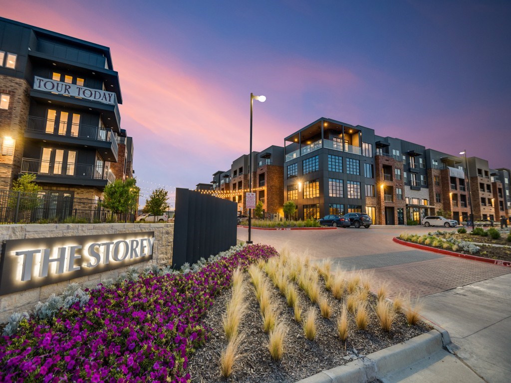 The Store is a modern apartment complex with a well-maintained garden in front.