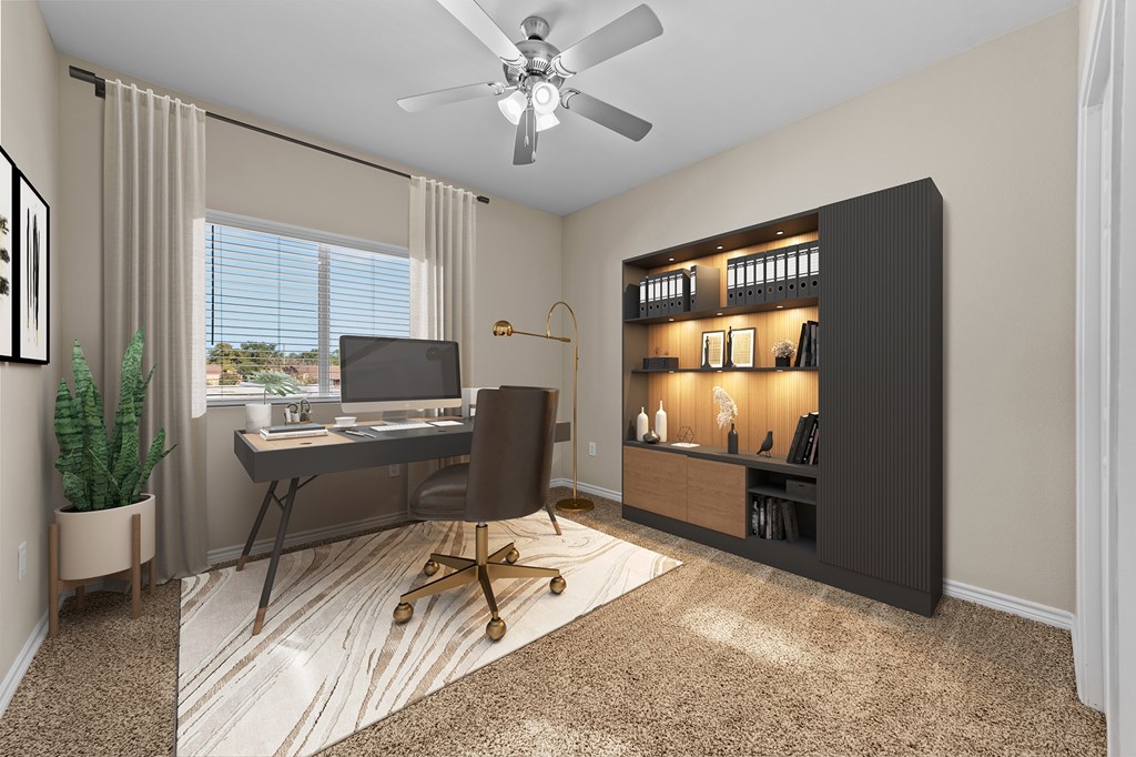 A room with a desk, chair, and a ceiling fan.