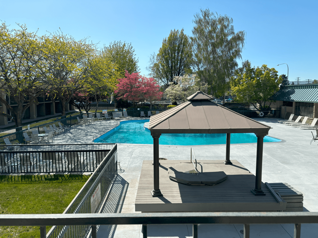 9 North Apartments pool with lounge chairs