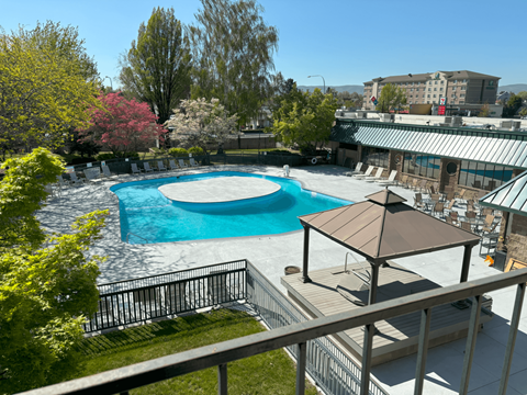 9 North Apartments pool with lounge chairs