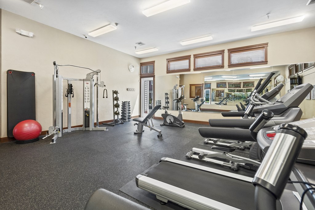 Little Tuscany Apartments & Townhomes - Fitness Room with Free Weights, Bench, Treadmill, Elliptical, Stationary Bike