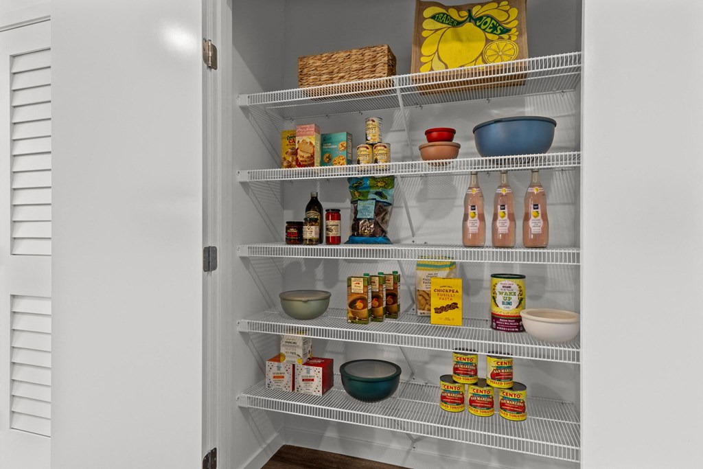 a refrigerator with shelves filled with food and drinks
