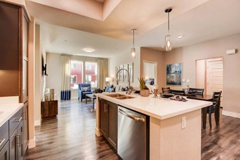 The Mercer Apartments Model Kitchen and Dining room The Mercer Apartments Model Kitchen and Dining room - Photo Gallery 2