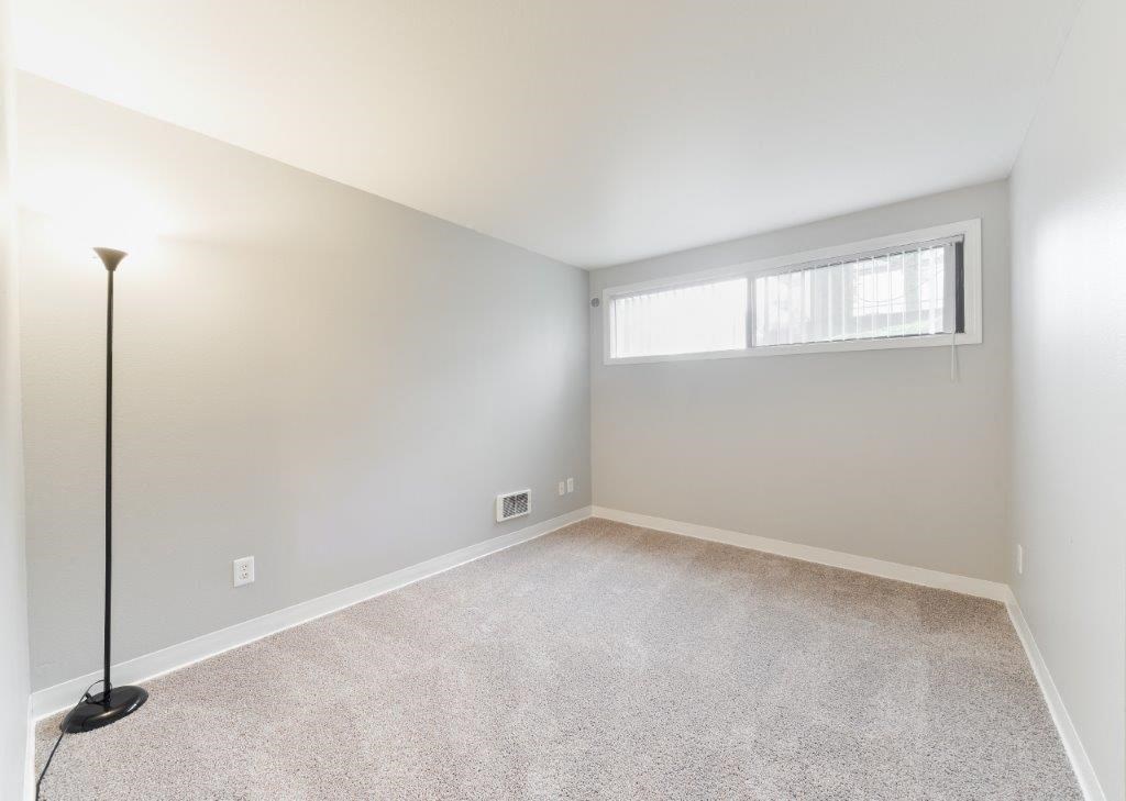 Beacon View Apartments Bedroom with Lamp