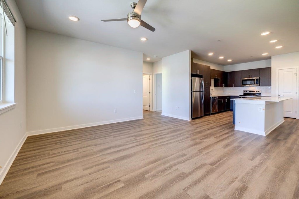 Solace at Rainier Ridge Apartments Kitchen with Island and Living Room