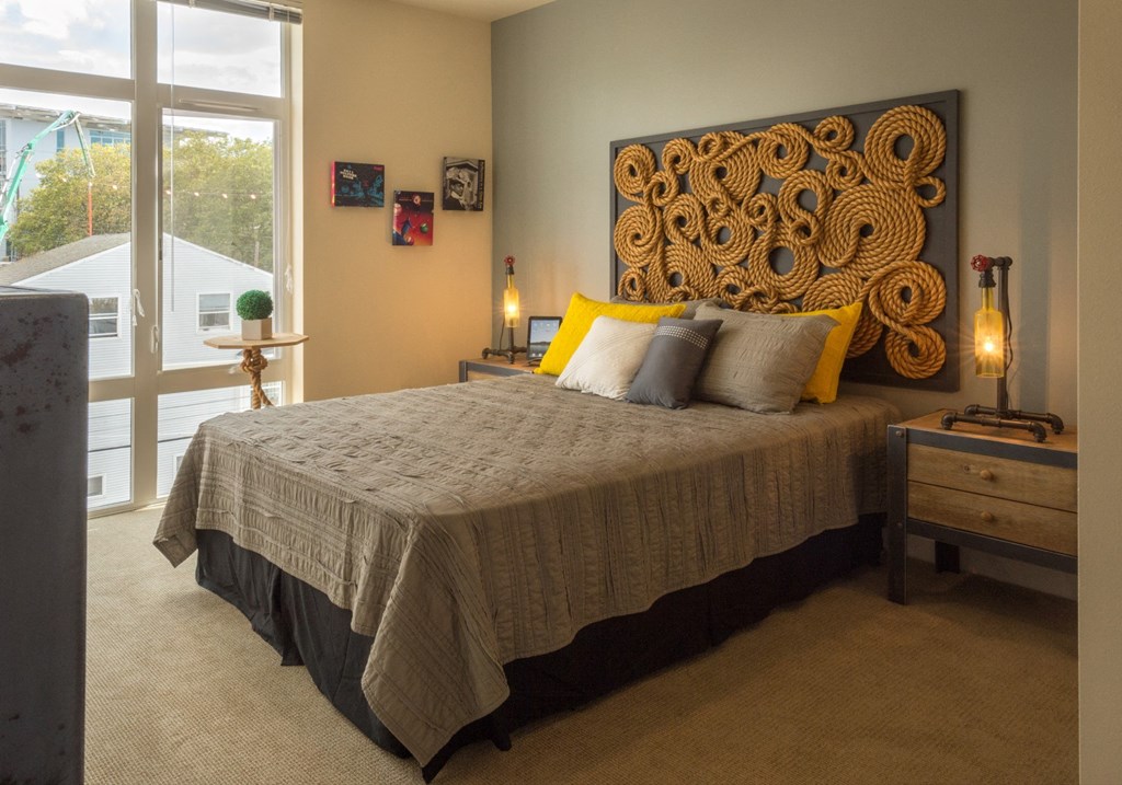 REO Flats Model Bedroom with Large Windows
