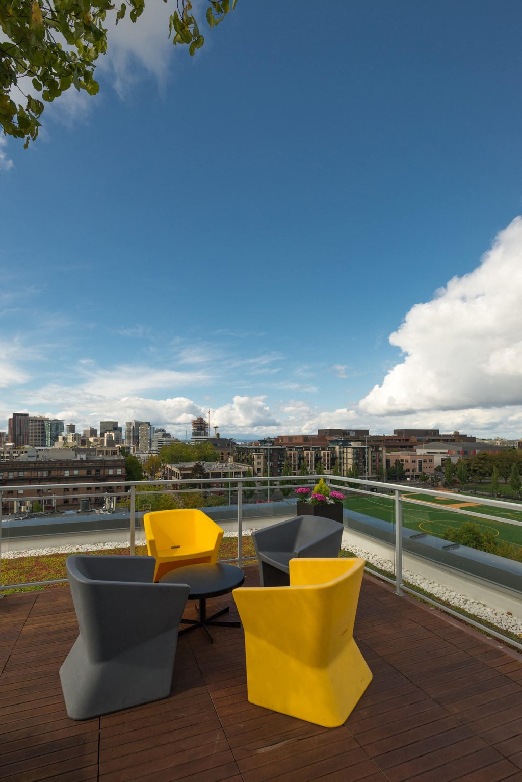 Sunset Electric Rooftop Deck with View of Baseball Field