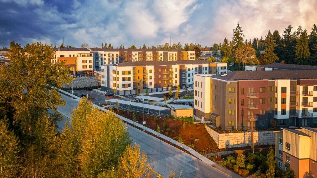 an aerial view of Alexan Gateway  buildings and trees