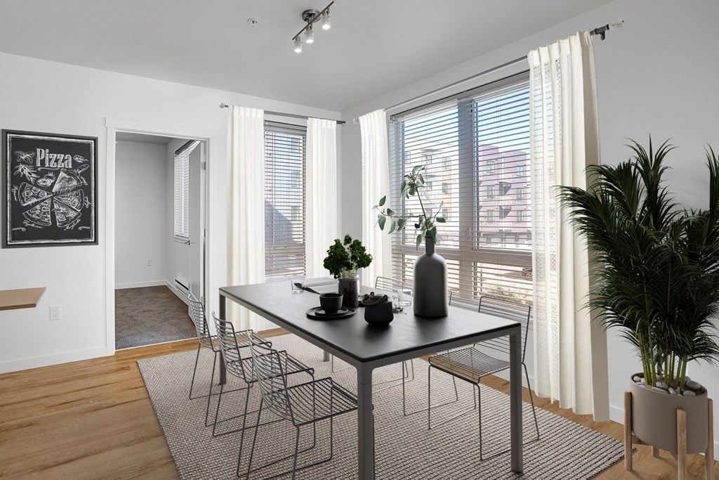 Alexan Gateway Apartments Dining room with large dining table