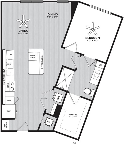 A floor plan of a house with a living room, dining room, bedroom, and kitchen.