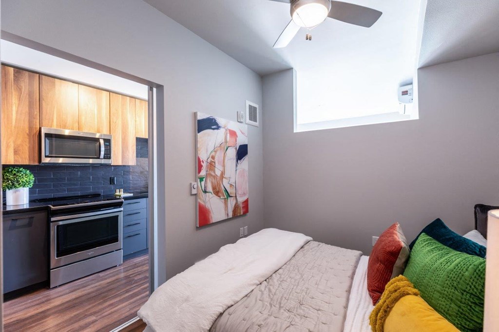 Alexan 100 Apartments Model Bedroom and Doorway