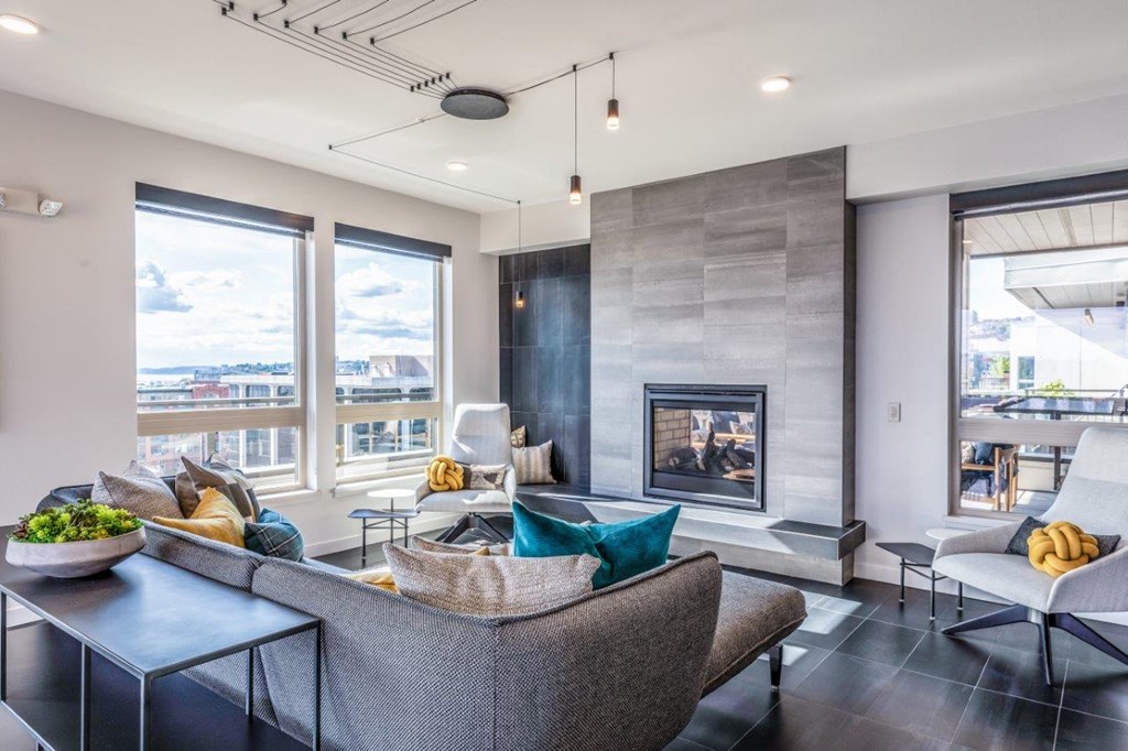 Alexan 100 Apartments Clubhouse and Fireplace