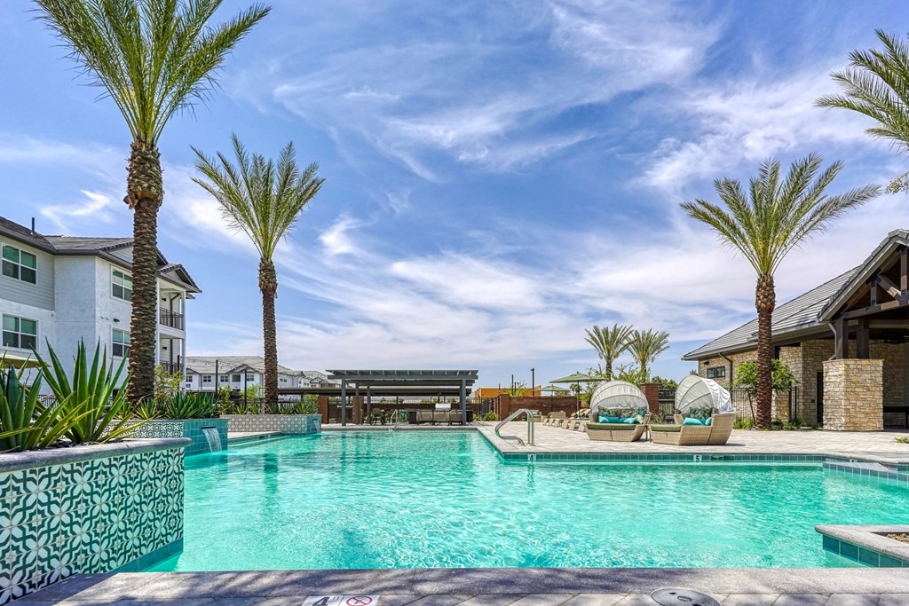 Allora Surprise Apartments in Surprise, Arizona Pool with Lounge Chairs