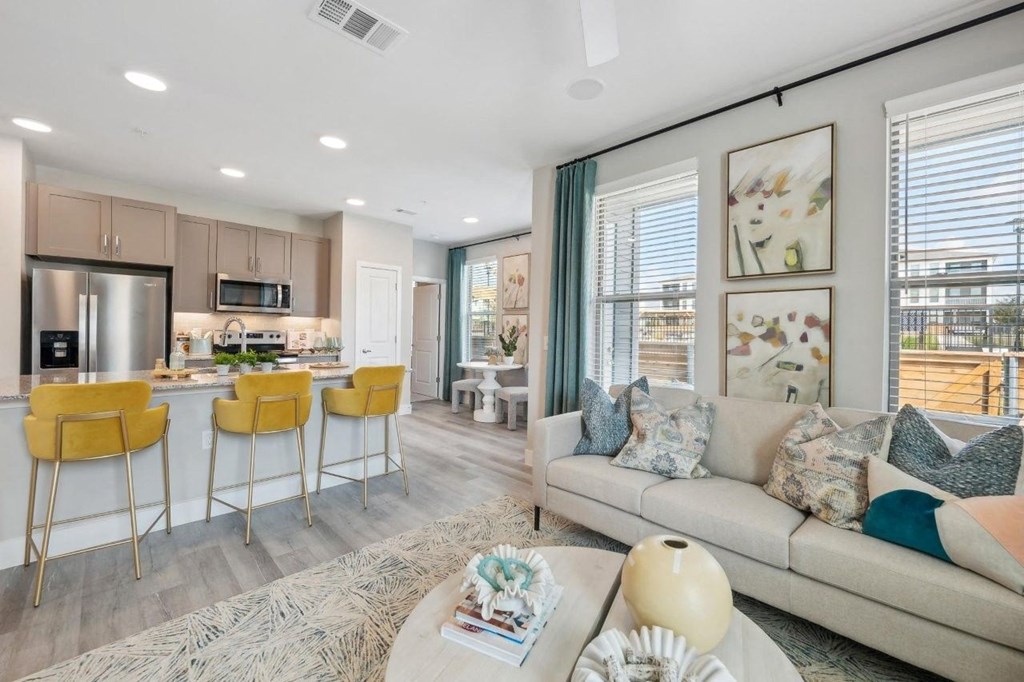 Alta Center Point Apartments in San Marcos, Texas Model Living Room and Kitchen