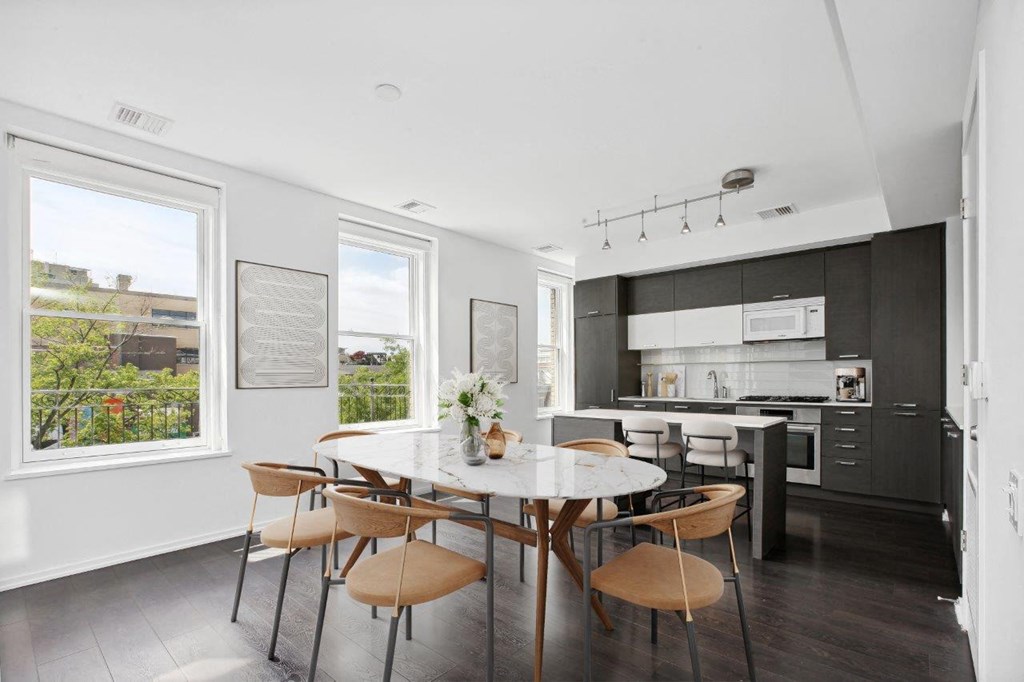 Alton District Luxury Apartments in Washington, DC Model Kitchen with Island and Dining Area