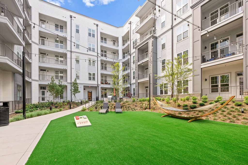 Alton Mill District Apartments in Charlotte, North Carolina Courtyard with Corn Hole