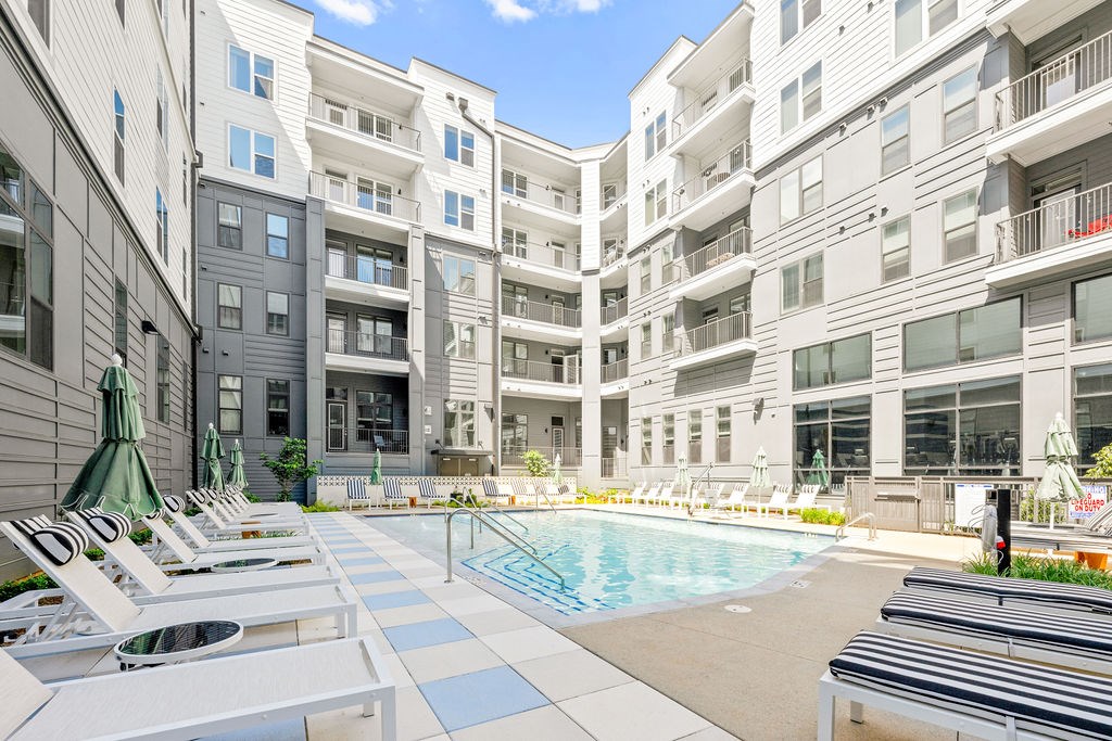 Alton Mill District Apartments in Charlotte, North Carolina Pool with Lounge Chairs