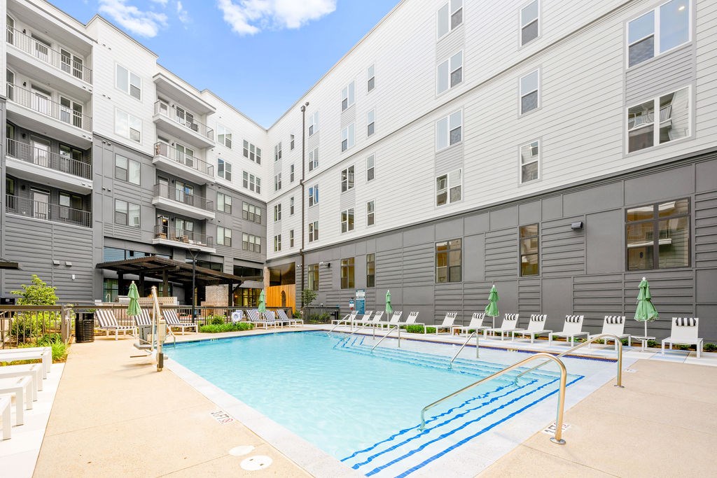 Alton Mill District Apartments in Charlotte, North Carolina Pool with Lounge Chairs