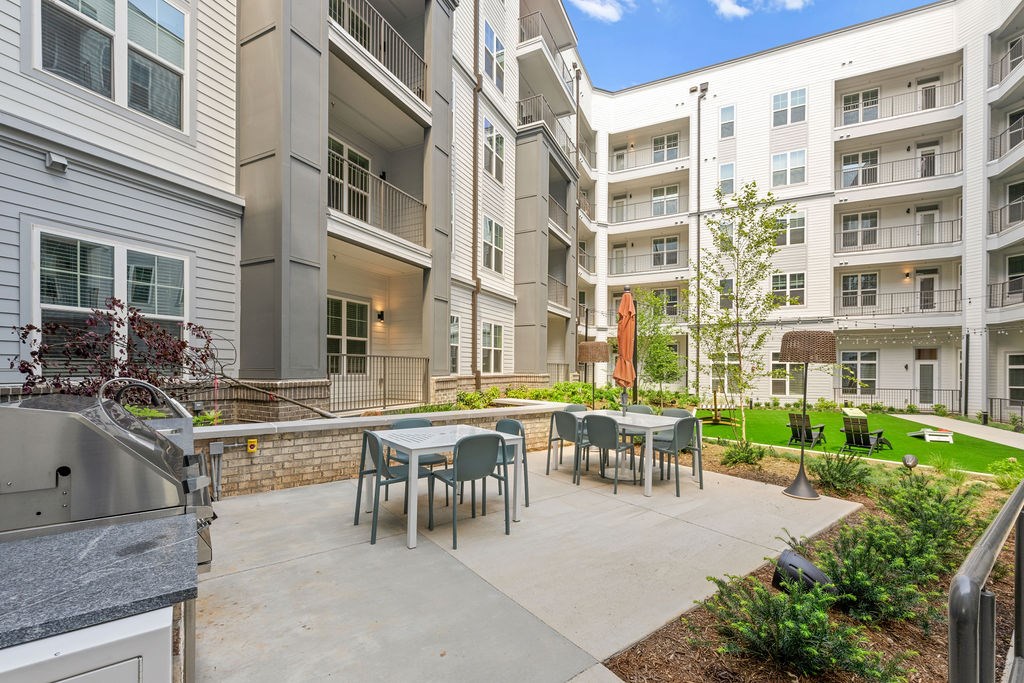 Alton Mill District Apartments in Charlotte, North Carolina Patio with Seating and BBQ Grills