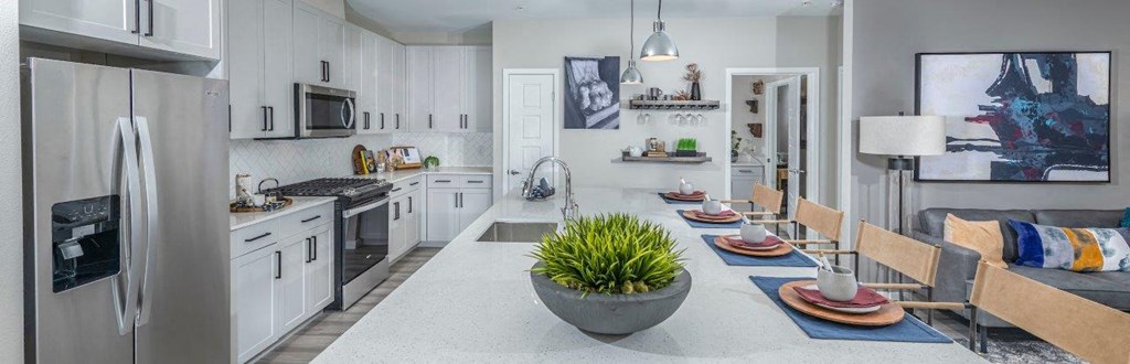 Alton Southern Highlands Apartments in Las Vegas, Nevada Model Kitchen with Large Island and Living Room