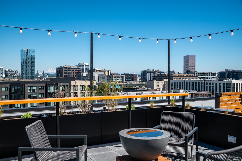 MERX rooftop patio with a hot tub and chairs overlooking the Pearl District and Mount Hood in the heart of Portland Oregon's beloved Slabtown neighborhood.