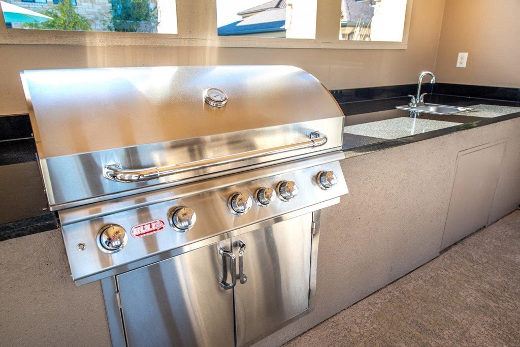 a stainless steel stove top oven in a kitchen