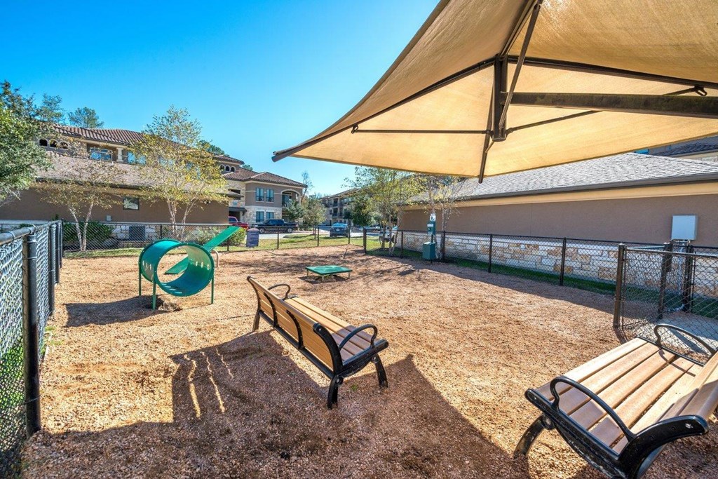 our apartments showcase a dog park with a playground