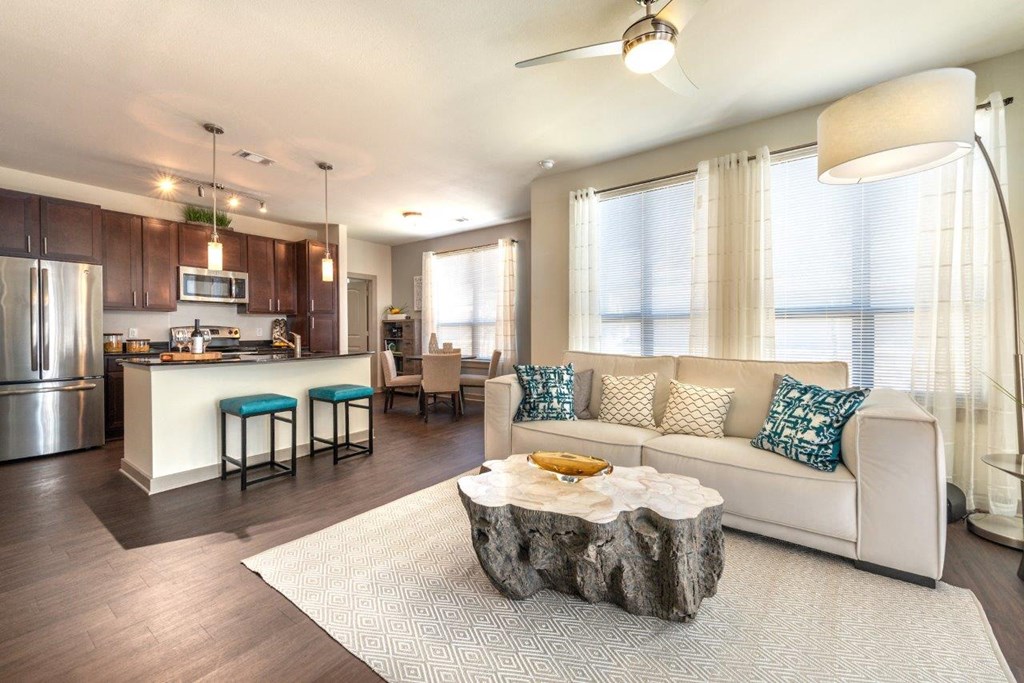 a living room with a couch and a table