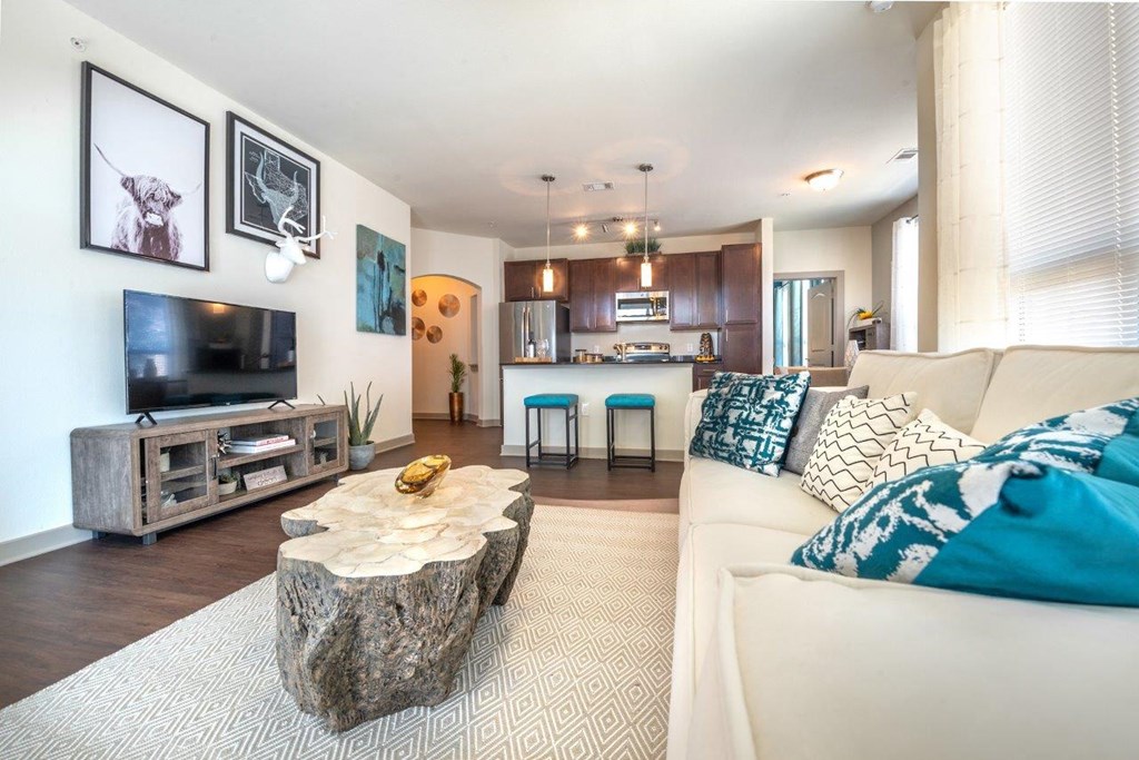 a living room with a couch and a tv