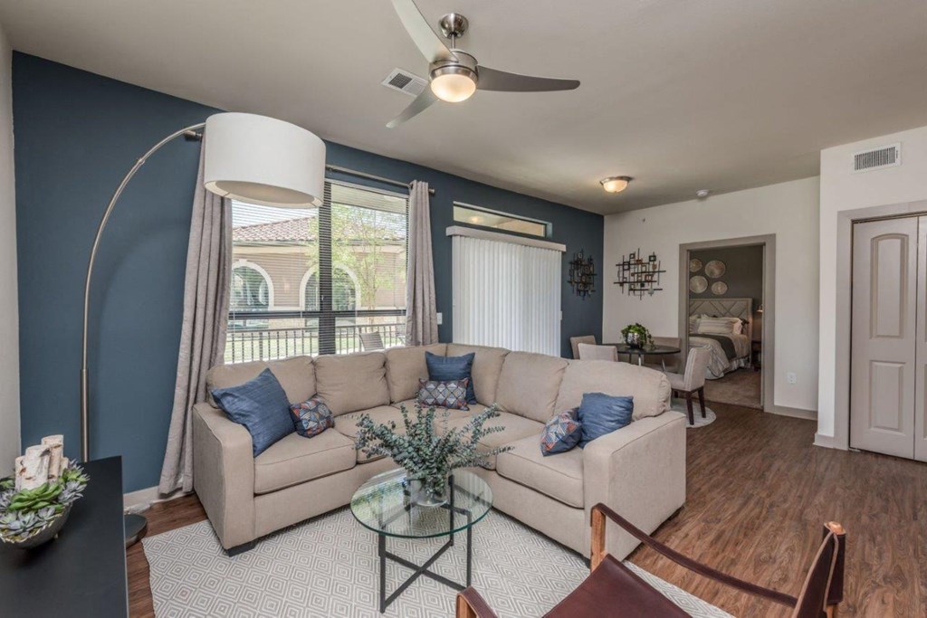 a living room with a couch and a table