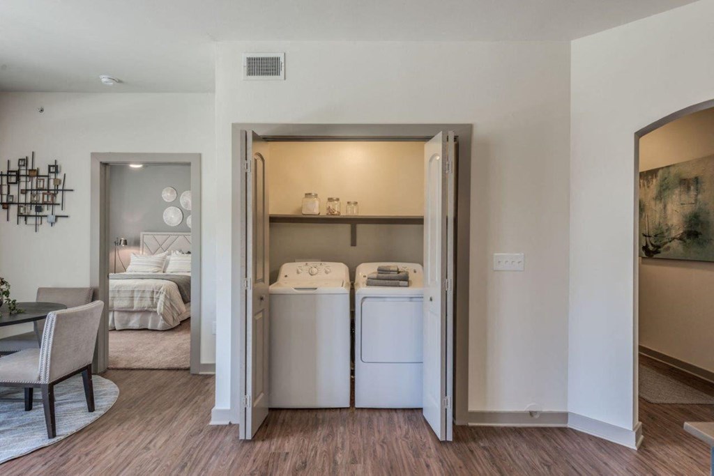 a room with a washer and dryer in it