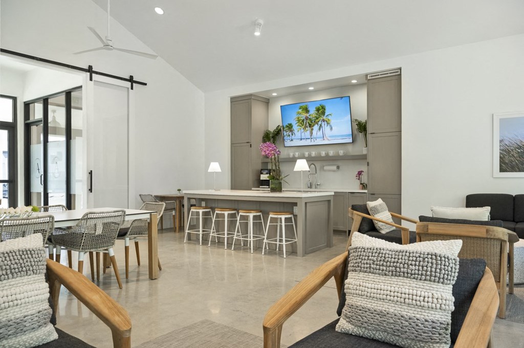 Argos by Soltura Rental Homes lounge living room and dining area with a kitchen and a television