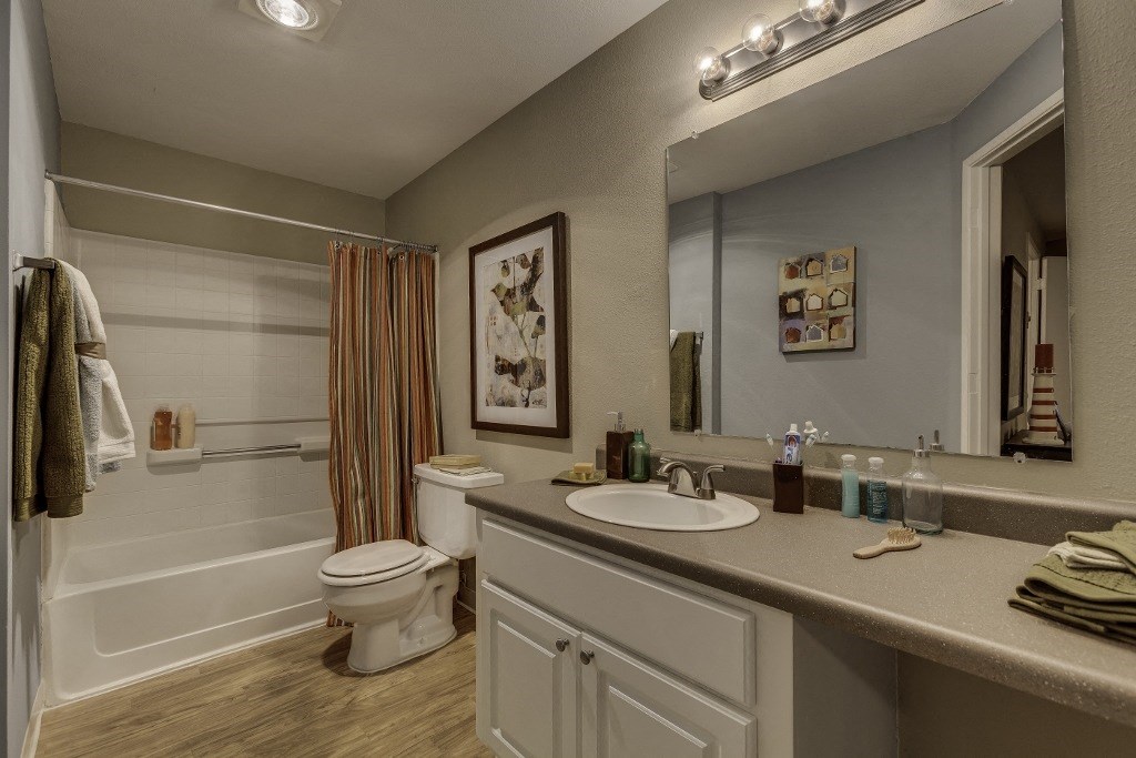 Arnada Pointe bathroom with white cabinets