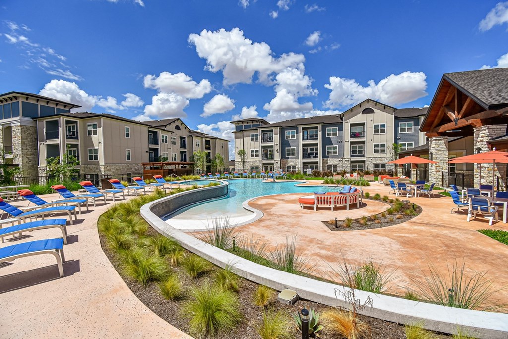 Aspire at Live Oak Outdoor Pool with Lounge Chairs